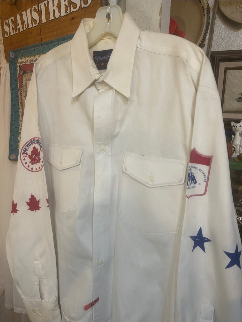 Wrangler White Button-Down Shirt with Red & Blue Sleeve Accents.